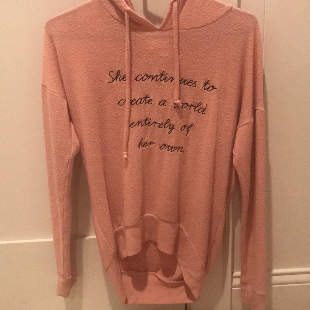 A lightweight pink sweater